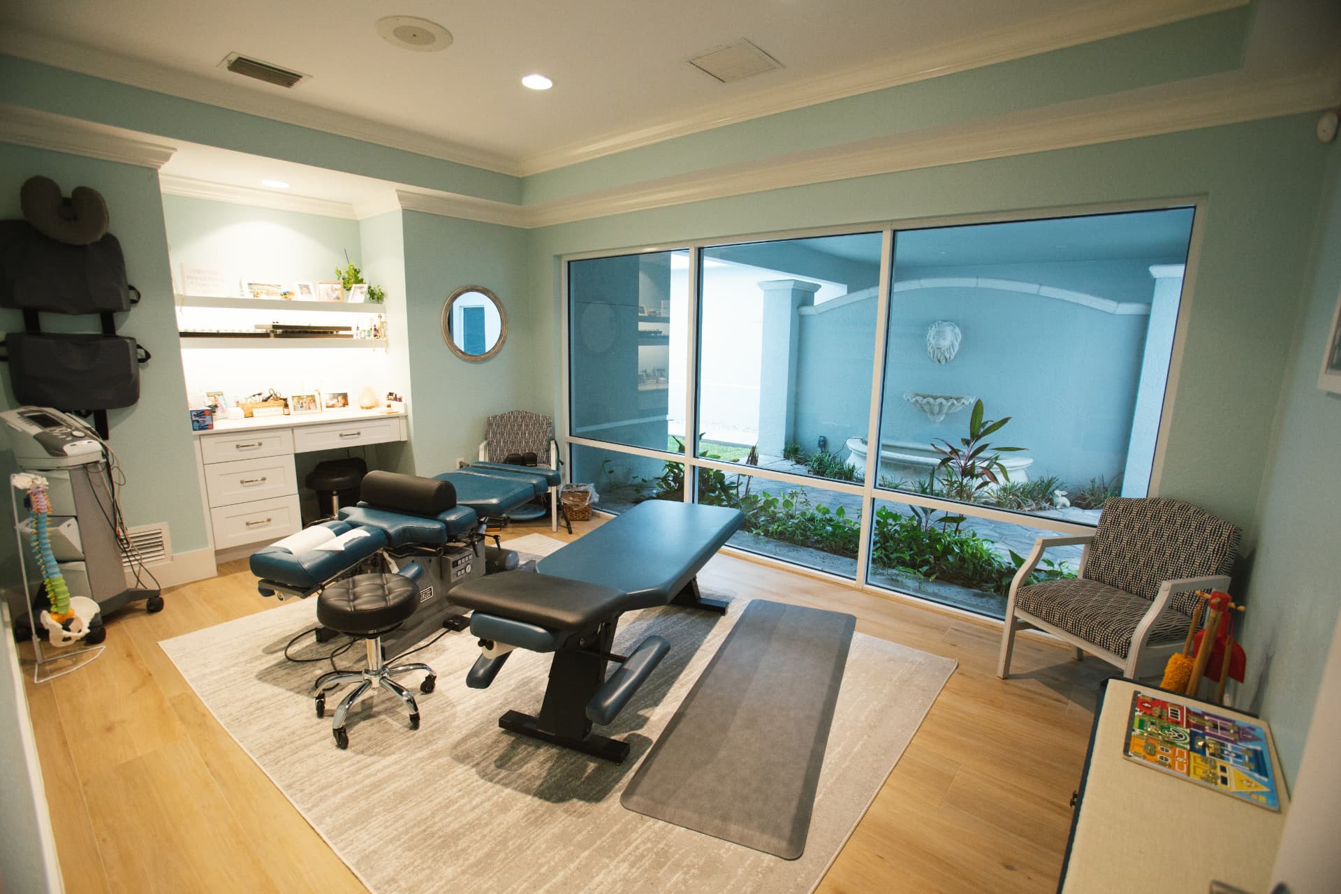 SOT® chiropractic adjustment suite with courtyard view in Naples, FL